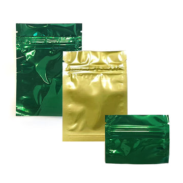 Busta di plastica con zip color verde e color oro in tre diverse misure